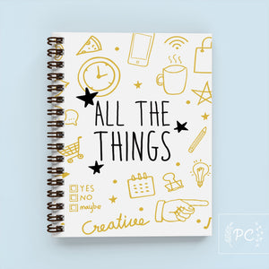 spiral bound notebook, all the things printed on the front, lined, soft cover, made in Canada