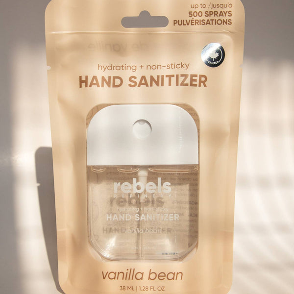 Hand sanitizer packaging with vanilla bean scent on a neutral background