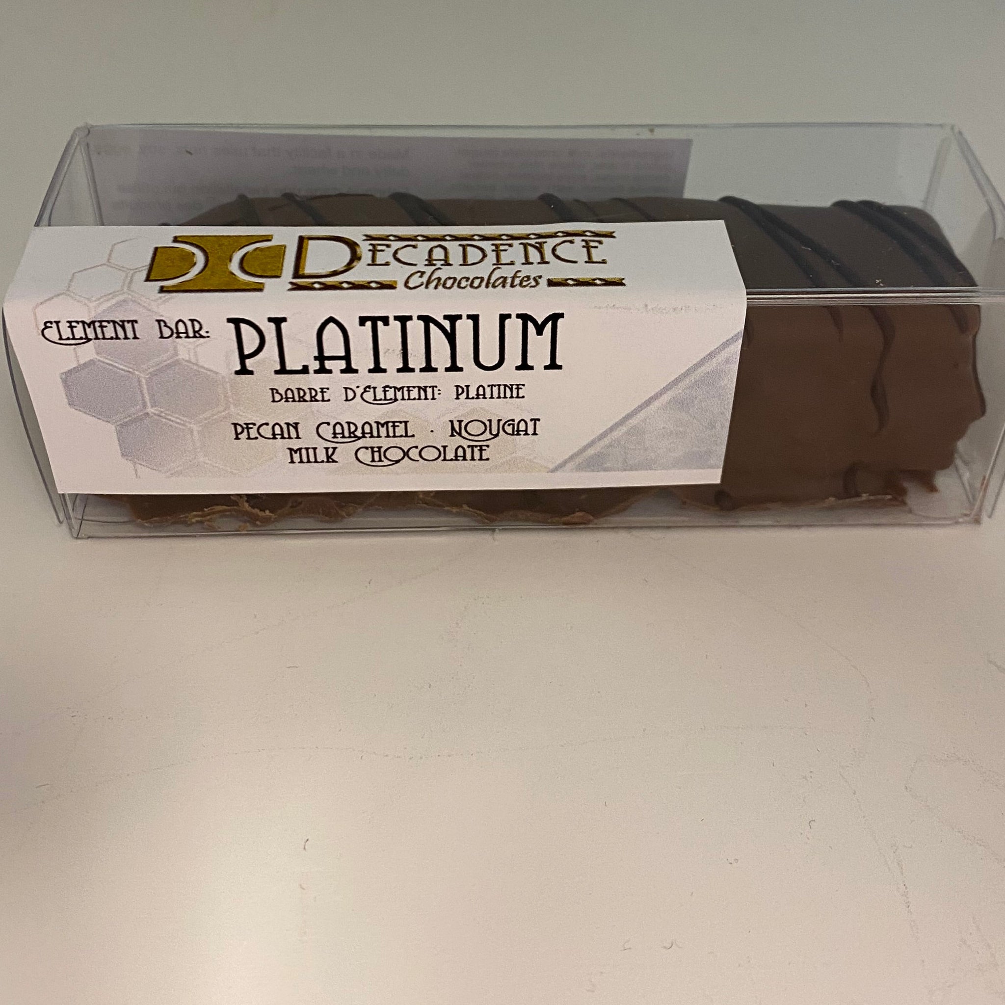 Decadence Platinum chocolate bar packaging on a neutral background