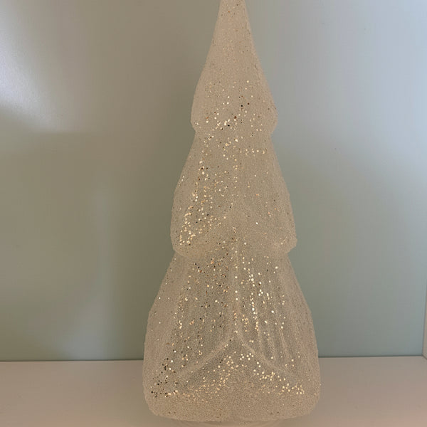 Decorative wall piece resembling a textured cone on a plain background