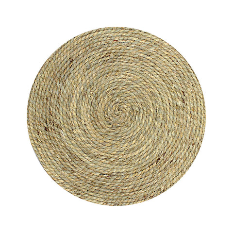 Round woven mat on a white background