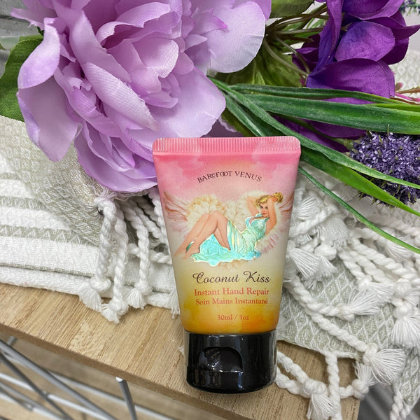Hand cream with a fairy design on a wooden surface with purple flowers