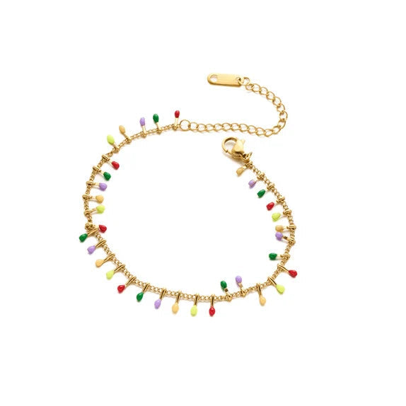 A delicate gold chain bracelet adorned with small, colorful bead drops in red, green, yellow, purple, and white, displayed on a clean white background.