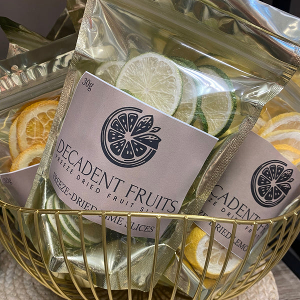Decadent Fruits packaging with dried fruits and a gold cage