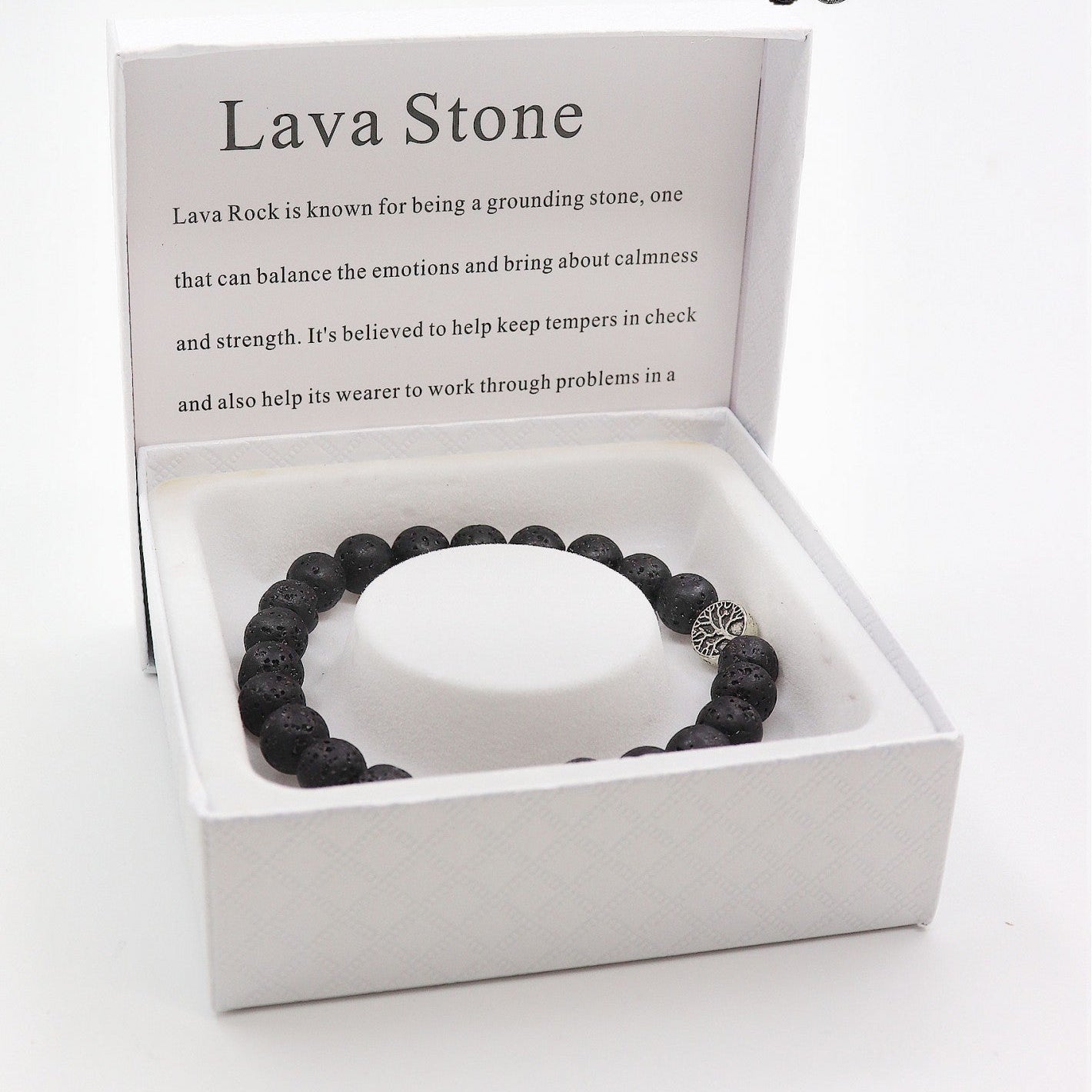 Lava stone bracelet in a white box with descriptive text on a white background