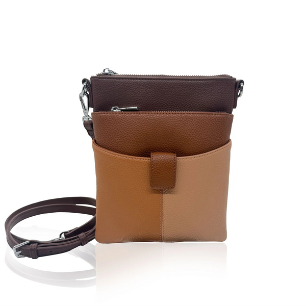 A three-compartment crossbody pouch bag made of leather in brown, tan, and dark brown, featuring a front strap closure and a detachable dark brown shoulder strap, shown on a white background with a soft reflection.