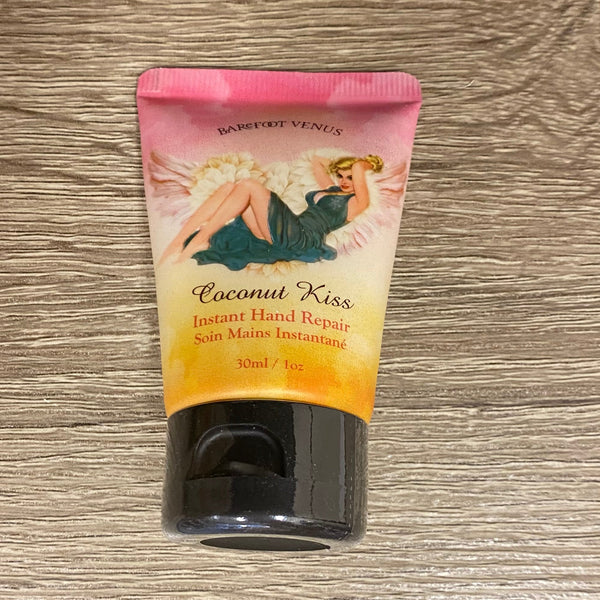 Hand cream with a colorful label on a wooden surface