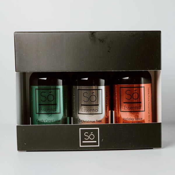 Three So essential oils in a black box on a light gray background