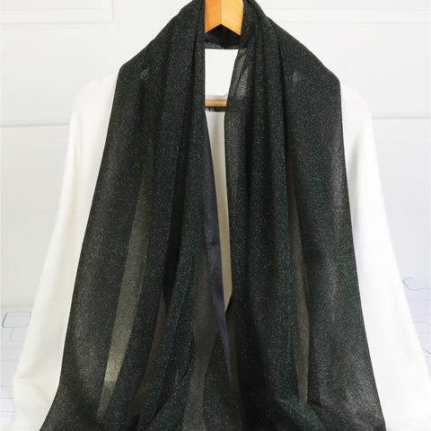 black scarf with shimmer thread throughout on a white background