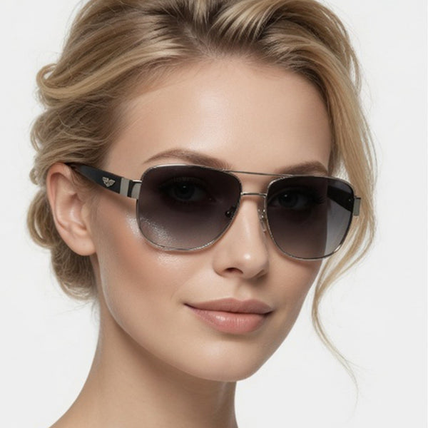 Woman wearing dark sunglasses with a neutral background