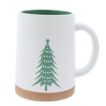White mug with a green Christmas tree design on a white background