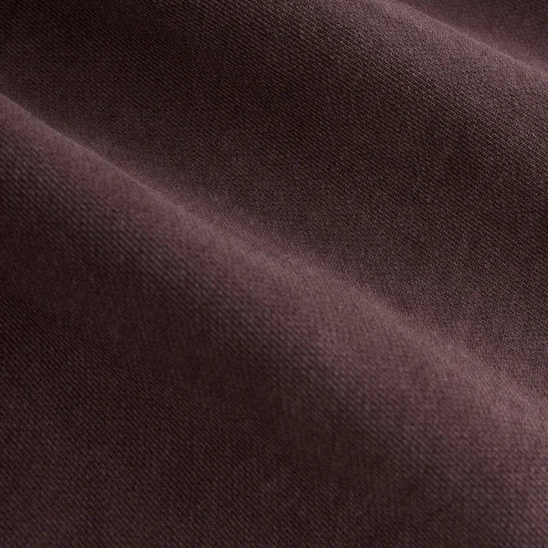 Close-up of dark brown fabric texture