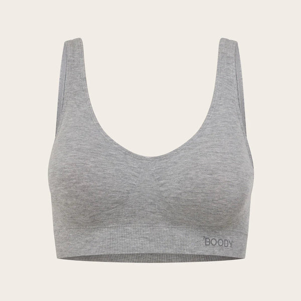 Gray sports bra with 'BOODY' branding on a light beige background