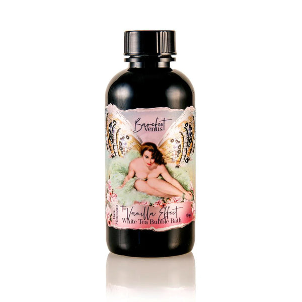 Bottle of 'Vanilla Effect' white tea bubble bath with a decorative label on a white background